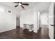 Spacious bedroom featuring hardwood floors, white trim, and a built-in desk at 823 W Palo Verde Dr, Phoenix, AZ 85013