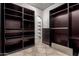Spacious walk-in closet with custom shelving and drawers at 823 W Palo Verde Dr, Phoenix, AZ 85013