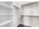 Walk-in closet featuring ample shelving and hanging space for optimal storage at 823 W Palo Verde Dr, Phoenix, AZ 85013
