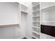 Well organized walk-in closet with shelving, racks, and lots of space at 823 W Palo Verde Dr, Phoenix, AZ 85013