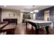 Game room offering a pool table, wet bar, and ample space for entertainment at 823 W Palo Verde Dr, Phoenix, AZ 85013