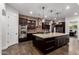 Gourmet kitchen with island, stainless steel appliances, and custom cabinets at 823 W Palo Verde Dr, Phoenix, AZ 85013