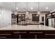 Spacious kitchen island, granite countertops, stainless steel appliances, and custom cabinets at 823 W Palo Verde Dr, Phoenix, AZ 85013