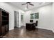 Home office features hardwood floors, natural light, and a functional workspace at 823 W Palo Verde Dr, Phoenix, AZ 85013