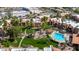An aerial view of a community with lush landscaping, a pool, walking paths, and a gazebo at 8256 E Arabian Trl # 239, Scottsdale, AZ 85258