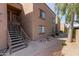 Condo exterior with stairs, walkway, and desert landscaping at 8256 E Arabian Trl # 239, Scottsdale, AZ 85258