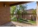 Balcony overlooking a beautifully landscaped green space with mature trees at 8256 E Arabian Trl # 239, Scottsdale, AZ 85258