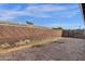 A fenced-in backyard with brickwork and ample space to enjoy outdoor activities at 848 W Calle Del Norte --, Chandler, AZ 85225