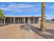 A single-story home with low-maintenance landscaping and a covered walkway at 848 W Calle Del Norte --, Chandler, AZ 85225
