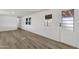 Bright living room featuring wood-look floors, white walls, and lots of natural light at 848 W Calle Del Norte --, Chandler, AZ 85225