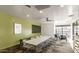 Bright clubhouse area with large table and seating, with modern design at 902 W Glendale Ave # 215, Phoenix, AZ 85021