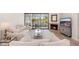 Bright living room features fireplace, balcony access and neutral tones, creating a comfortable atmosphere at 902 W Glendale Ave # 215, Phoenix, AZ 85021