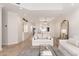 Spacious and bright living room featuring an open layout and modern decor and chandelier at 902 W Glendale Ave # 215, Phoenix, AZ 85021