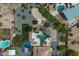 Aerial view showcasing large property with pool, sport courts, fire pit, and landscaping at 9053 N 123Rd St, Scottsdale, AZ 85259