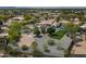 Aerial view of home with backyard featuring pool, firepit, sports courts, desert landscaping at 9053 N 123Rd St, Scottsdale, AZ 85259