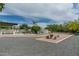 The community features a barbecue area and picnic tables on gravel paths in a desert landscape at 9053 N 123Rd St, Scottsdale, AZ 85259