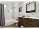 Bathroom featuring a shower/tub combo and a wood vanity at 9053 N 123Rd St, Scottsdale, AZ 85259