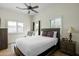 Bedroom featuring neutral paint, ceiling fan, and hardwood floors at 9053 N 123Rd St, Scottsdale, AZ 85259
