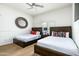 Well-lit bedroom featuring two twin beds with decorative pillows at 9053 N 123Rd St, Scottsdale, AZ 85259