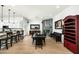 Open dining and kitchen area with stainless appliances, granite counters, and breakfast bar with seating at 9053 N 123Rd St, Scottsdale, AZ 85259