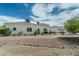 Beautiful home with a wide lot, tasteful landscaping, and a neutral exterior color scheme at 9053 N 123Rd St, Scottsdale, AZ 85259