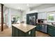 Well-equipped kitchen boasts granite countertops, stainless appliances, and backyard patio access at 9053 N 123Rd St, Scottsdale, AZ 85259