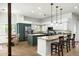 Bright kitchen with stainless appliances, granite counters, island and breakfast bar with seating at 9053 N 123Rd St, Scottsdale, AZ 85259