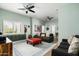 Spacious living room featuring two couches, ottomon, and accent rug at 9053 N 123Rd St, Scottsdale, AZ 85259