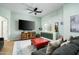Spacious living room featuring a flat screen tv, and green cabinetry at 9053 N 123Rd St, Scottsdale, AZ 85259