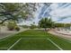 Backyard soccer field of artificial turf with white painted lines and goals, with a view of the sky at 9053 N 123Rd St, Scottsdale, AZ 85259