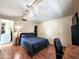 Bright bedroom with ceiling fan, wood-look flooring and desk with natural light at 9333 E University Dr # 184, Mesa, AZ 85207