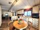 Bright kitchen with a cozy breakfast table, abundant cabinet space, and essential appliances for home cooking at 9333 E University Dr # 184, Mesa, AZ 85207