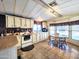 Well-lit kitchen showcases ample cabinetry, appliances, and a cozy breakfast nook for casual dining at 9333 E University Dr # 184, Mesa, AZ 85207