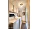 Convenient laundry area with appliances and storage cabinets, providing functionality at 9333 E University Dr # 184, Mesa, AZ 85207