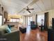Spacious living room with modern flooring, comfortable seating, and an open layout connecting to the kitchen at 9333 E University Dr # 184, Mesa, AZ 85207