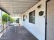 Inviting covered patio with a table and chairs, perfect for outdoor dining and relaxation at 9333 E University Dr # 184, Mesa, AZ 85207