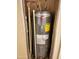 This close up shows a Rheem water heater installed inside a home at 9333 E University Dr # 184, Mesa, AZ 85207