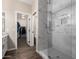 Modern bathroom with walk-in shower featuring glass door and tile surround at 9717 E Holiday Way, Sun Lakes, AZ 85248