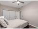 Neutral bedroom featuring double closets and a ceiling fan at 9717 E Holiday Way, Sun Lakes, AZ 85248