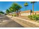 Welcome to Oakwood Country Club, golf course and restaurant with lush landscaping in a gated community at 9717 E Holiday Way, Sun Lakes, AZ 85248