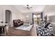 Bright living room features comfortable seating, a sliding glass door, and neutral paint at 9717 E Holiday Way, Sun Lakes, AZ 85248