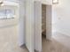 View of hallway including a closet for extra storage at 10101 N 91St Ave # 162, Peoria, AZ 85345
