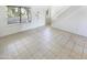 Bright living room with tile flooring, a staircase, and a large window letting in natural light at 10101 N 91St Ave # 162, Peoria, AZ 85345