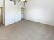 Bright main bedroom featuring neutral carpet, and ample closet space at 10101 N 91St Ave # 162, Peoria, AZ 85345