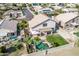 Aerial view of home with a backyard featuring a pool, patio, and lawn at 11317 W Cottonwood Ln, Avondale, AZ 85392