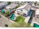Overhead view highlighting the property's backyard with pool, patio, and green lawn at 11317 W Cottonwood Ln, Avondale, AZ 85392