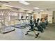 Bright fitness center featuring treadmills, ellipticals, and weight lifting equipment at 12222 N Paradise Village Pkwy # 321, Phoenix, AZ 85032