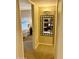 Hallway that provides views into the main living area and a bedroom at 12222 N Paradise Village Pkwy # 321, Phoenix, AZ 85032
