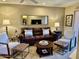 Cozy living room with comfortable seating and a stylish mirror to enhance the space at 12222 N Paradise Village Pkwy # 321, Phoenix, AZ 85032