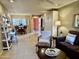 Open-concept living room flowing into a dining area, perfect for entertaining and relaxation at 12222 N Paradise Village Pkwy # 321, Phoenix, AZ 85032